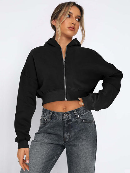 Casual black long-sleeved fleece zipper hoodie with cropped fit, perfect for spring and fall style.